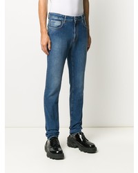 blaue enge Jeans von Moschino