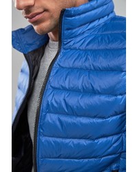 blaue gesteppte ärmellose Jacke von next