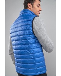 blaue gesteppte ärmellose Jacke von next