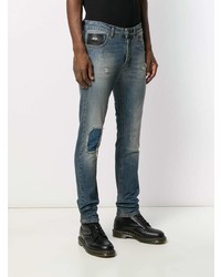 blaue Jeans mit Destroyed-Effekten von John Richmond