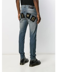 blaue Jeans mit Destroyed-Effekten von John Richmond