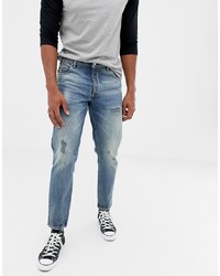 blaue Jeans mit Destroyed-Effekten von ASOS DESIGN