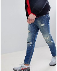 blaue Jeans mit Destroyed-Effekten von ASOS DESIGN