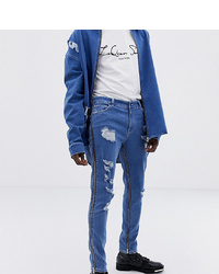 blaue Jeans mit Destroyed-Effekten von ASOS DESIGN