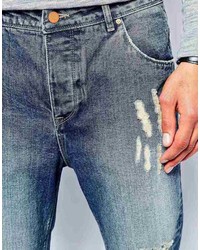 blaue Jeans mit Destroyed-Effekten von Asos