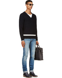 blaue Jeans mit Destroyed-Effekten von Balmain