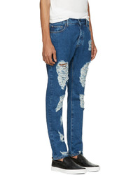 blaue Jeans mit Destroyed-Effekten von Palm Angels