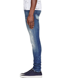 blaue Jeans mit Destroyed-Effekten von Diesel