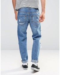 blaue Jeans mit Destroyed-Effekten von Asos