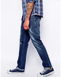 blaue Jeans mit Destroyed-Effekten von Asos