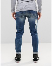 blaue Jeans mit Destroyed-Effekten von Asos