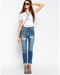 blaue Jeans mit Destroyed-Effekten von Asos