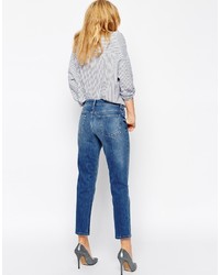 blaue Jeans mit Destroyed-Effekten von Asos