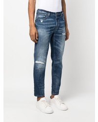 blaue Jeans mit Destroyed-Effekten von Dondup