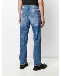 blaue Jeans mit Destroyed-Effekten von Diesel