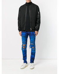 blaue Jeans mit Destroyed-Effekten von Balmain