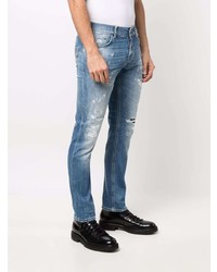 blaue Jeans mit Destroyed-Effekten von Dondup