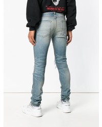 blaue Jeans mit Destroyed-Effekten von Amiri