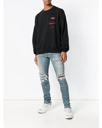 blaue Jeans mit Destroyed-Effekten von Amiri