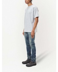 blaue Jeans mit Destroyed-Effekten von John Elliott