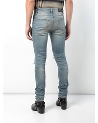 blaue Jeans mit Destroyed-Effekten von Amiri