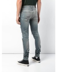 blaue Jeans mit Destroyed-Effekten von Amiri