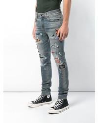 blaue Jeans mit Destroyed-Effekten von Amiri