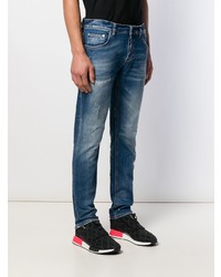 blaue Jeans mit Destroyed-Effekten von Dondup