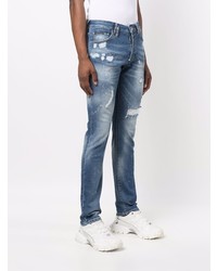 blaue Jeans mit Destroyed-Effekten von Philipp Plein