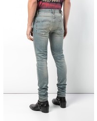 blaue Jeans mit Destroyed-Effekten von Amiri