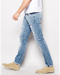 blaue Jeans mit Destroyed-Effekten von Lee