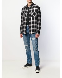 blaue Jeans mit Destroyed-Effekten von Philipp Plein