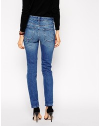 blaue Jeans mit Destroyed-Effekten von Asos