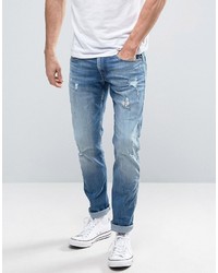 blaue Jeans mit Destroyed-Effekten von Replay