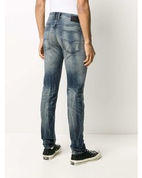 blaue Jeans mit Destroyed-Effekten von Diesel