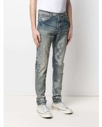 blaue Jeans mit Destroyed-Effekten von Amiri