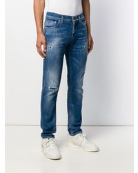 blaue Jeans mit Destroyed-Effekten von Dondup