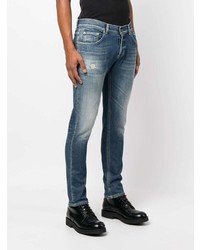 blaue Jeans mit Destroyed-Effekten von Dondup