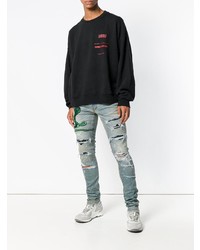 blaue Jeans mit Destroyed-Effekten von Amiri