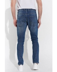 blaue Jeans mit Destroyed-Effekten von SteffenKlein