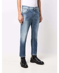 blaue Jeans mit Destroyed-Effekten von Dondup