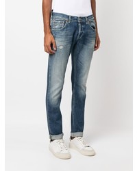 blaue Jeans mit Destroyed-Effekten von Dondup