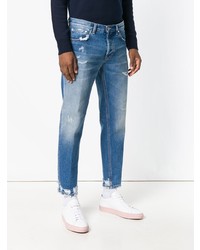 blaue Jeans mit Destroyed-Effekten von Dondup