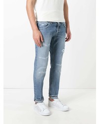 blaue Jeans mit Destroyed-Effekten von Dondup