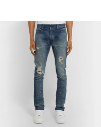 blaue Jeans mit Destroyed-Effekten von John Elliott