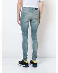 blaue Jeans mit Destroyed-Effekten von Amiri