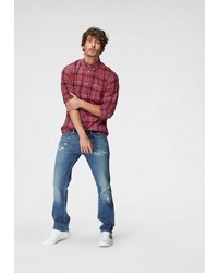 blaue Jeans mit Destroyed-Effekten von Tommy Jeans