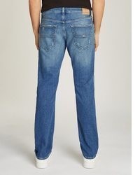 blaue Jeans mit Destroyed-Effekten von Tommy Jeans