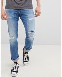 blaue Jeans mit Destroyed-Effekten von Tommy Jeans