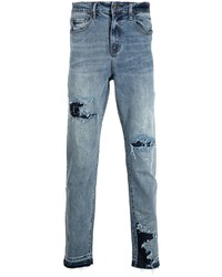 blaue Jeans mit Destroyed-Effekten von VAL KRISTOPHE